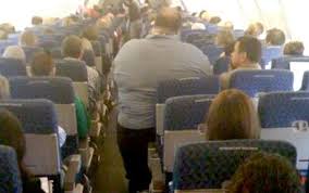 obese person on airplane